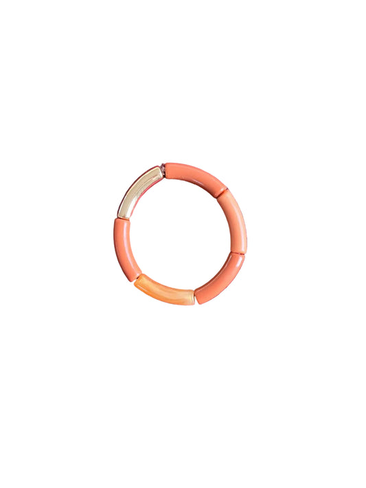 Bracelet rosé avec touche d'orange
