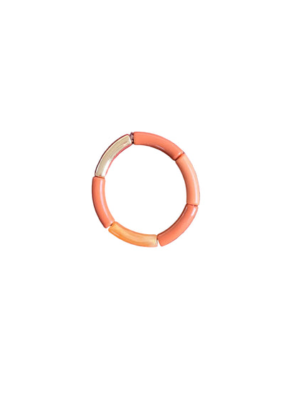 Bracelet rosé avec touche d'orange